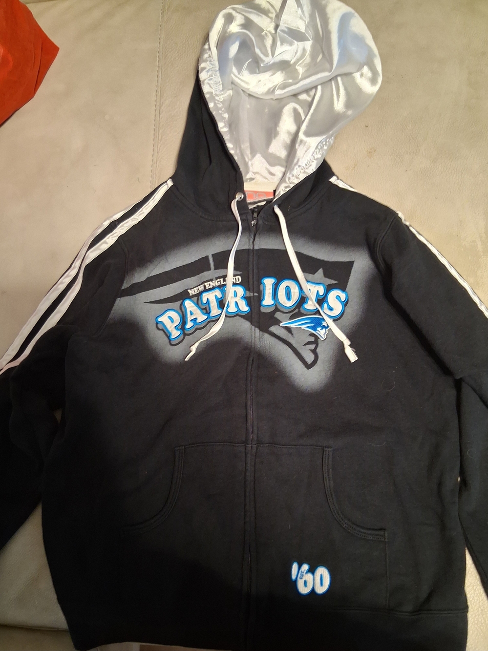 NFL Black Kids Hoodie with White Lined Hood and Blue Patriots Logo